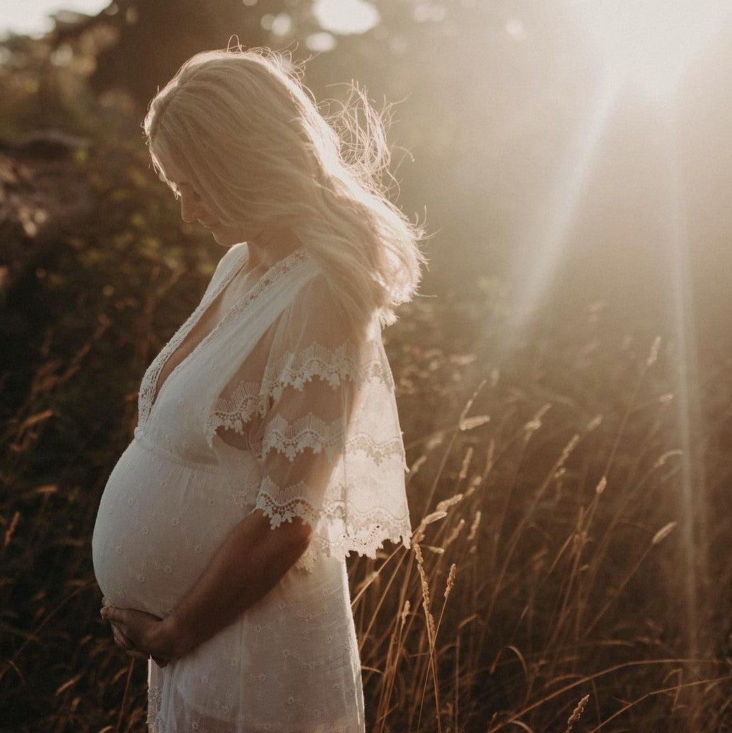 Maternity Photoshoot with mum wearing a white maternity dress Melbourne