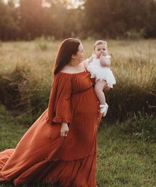 Plus size mum wearing lace maternity photoshoot dress from Everything Lace Hire Melbourne