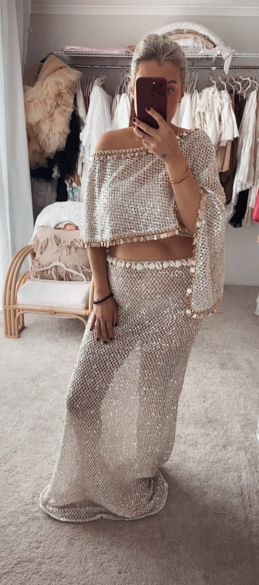 wearing a maternity photoshoot two piece set from Everything Lace Hire featuring a knit sequin fabric and embellished shell detailing