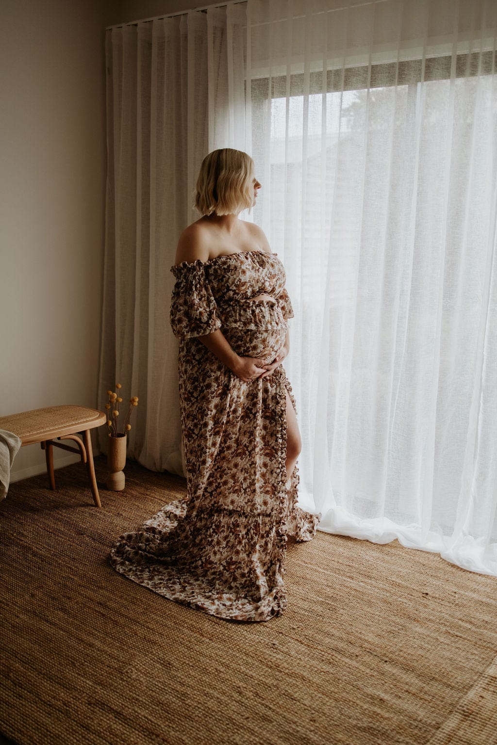 Pregnant lady wearing Everything Lace Hire In Bloom Two Piece Set while having a studio maternity photoshoot