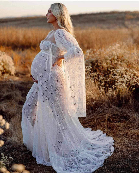 Glowing pregnant lady wearing Everything Lace Hire Gwendolyn maternity dress for her maternity photoshoot