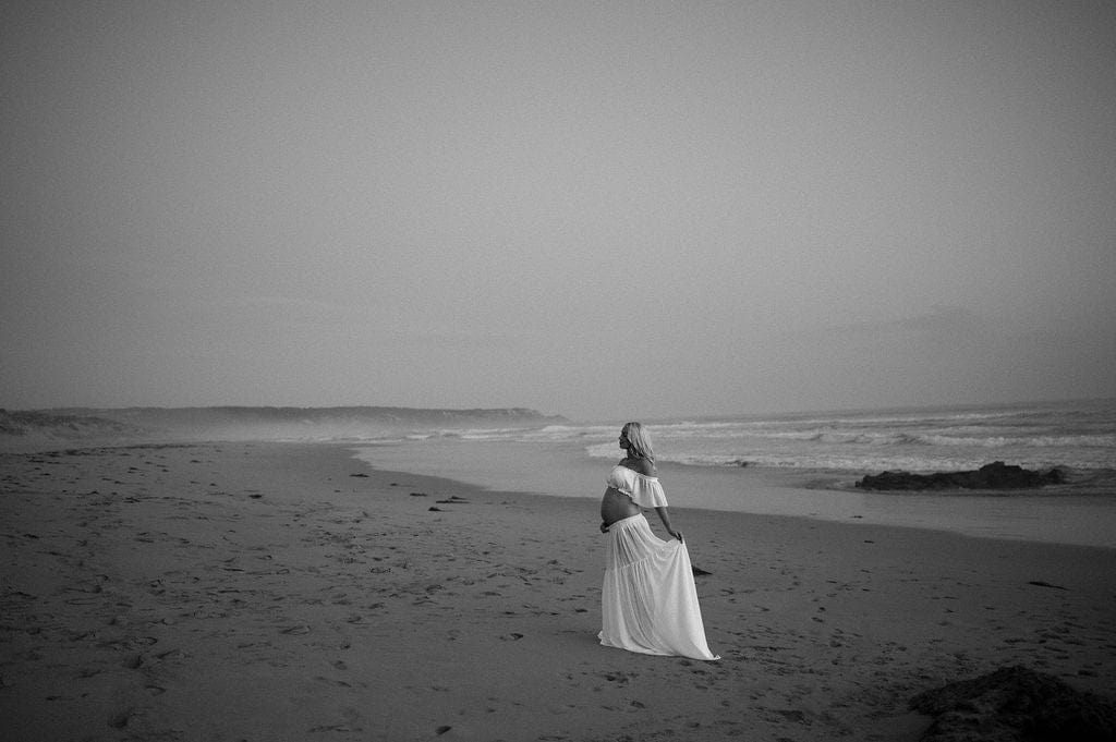 Beach maternity photoshoot on the Mornington Peninsula wearing Everything Lace Hire White Amara Two Piece Photoshoot Set