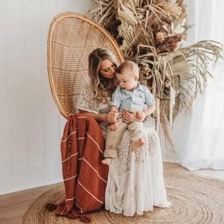 A beautiful mother wears Everything Lace Hire Alexandria dress during her motherhood photoshoot